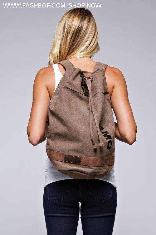 Ti Amo Cargo Backpack by Fashbop worn by a woman, featuring an oversized drawstring design for style and functionality.